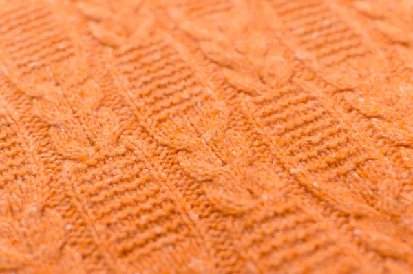 Closeup on Orange Handmade Knitted Fabric pattern — Stock Photo, Image