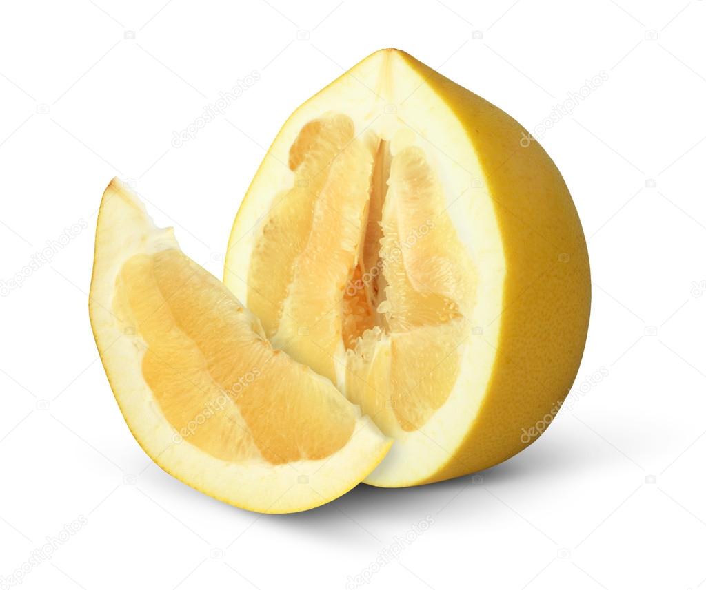 Half of pomelo fruit with slice isolated on white