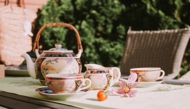 Tea party in chinese style in the summer garden