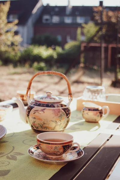 Tea party in chinese style in the summer garden
