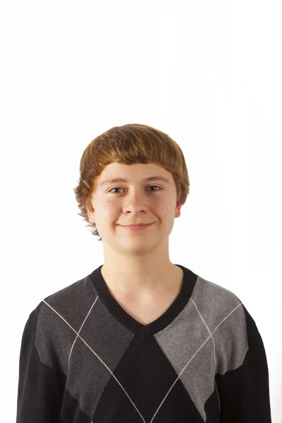 Smart happy young boy posing in studio — Stock Photo, Image