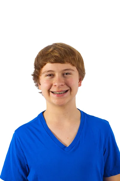 Smart happy young boy posing in studio Stock Image