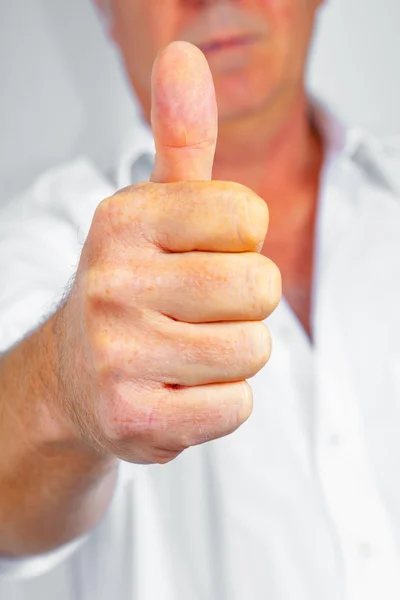 Hand gesturing the all right symbol — Stock Photo, Image