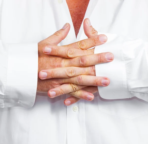 Detail of folded hands of a man — Stock Photo, Image