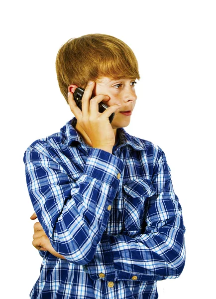 Cute handsome young boy speaking a mobile phone — Stock Photo, Image