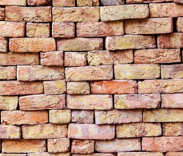 Stapled bricks give a harmonic pattern in red — Stock Photo, Image