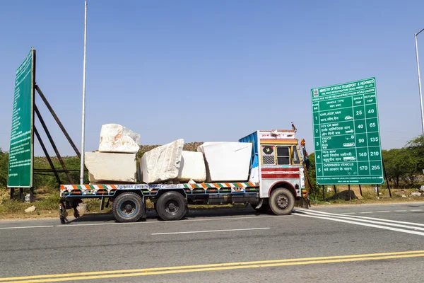 Lorry transports huge marble stones — Stock Photo, Image