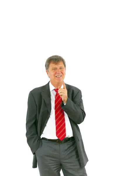 Hombre de negocios exitoso inteligente con corbata roja y traje negro —  Fotos de Stock