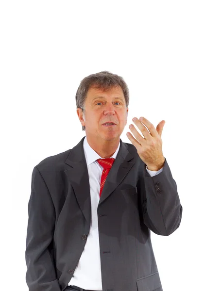 Розумний успішний бізнесмен з червоною краваткою і чорним костюмом — стокове фото