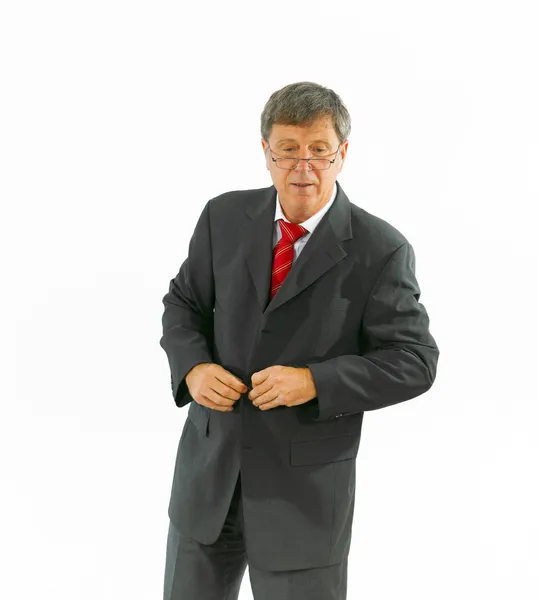 Smart framgångsrik affärsman med röd slips och svart kostym — Stockfoto