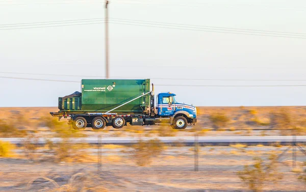 Truck on highway 8 in sunrise — Stock Photo, Image