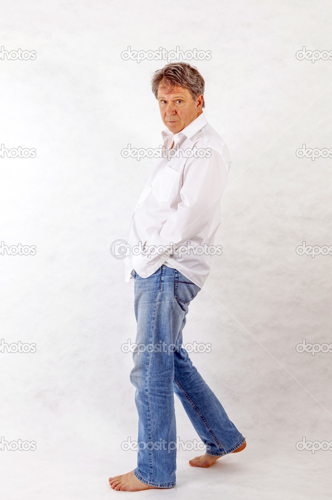 Man standing up against a white background