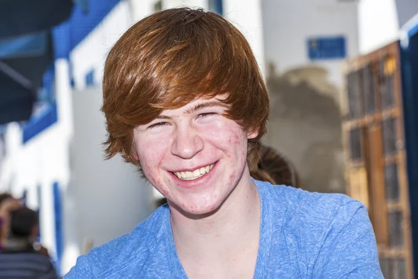 Outdoor portrait of relaxed cute young boy Stock Picture