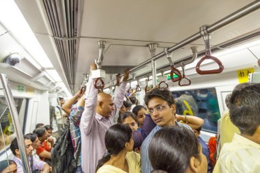 Passengers ride in the metro train clipart