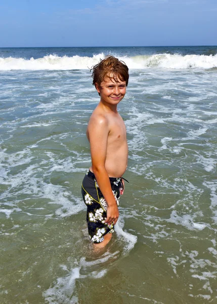 Happy boy in the ocean — Stock Photo, Image