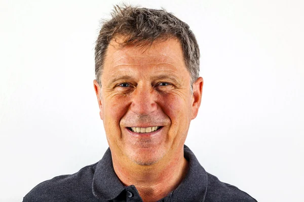 Handsome smiling man in black leisure shirt — Stock Photo, Image