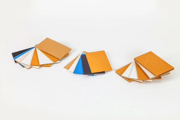 Cardboard samples in different thickness and color — Stock Photo, Image