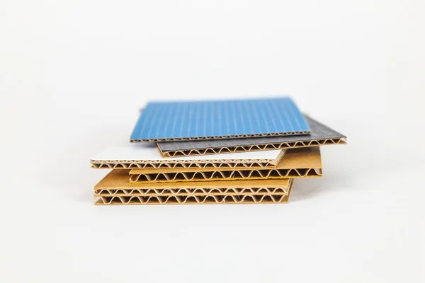 Cardboard samples in different thickness and color — Stock Photo, Image