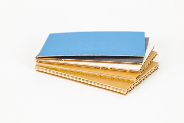 Cardboard samples in different thickness and color — Stock Photo, Image