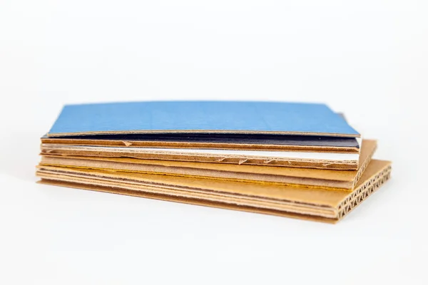 Cardboard samples in different thickness and color — Stock Photo, Image