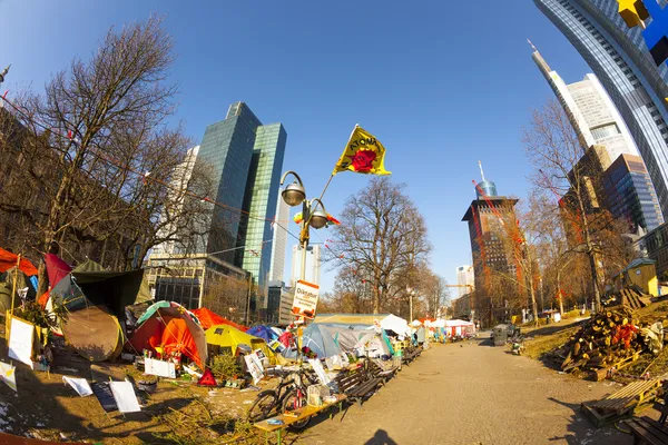 Euro symbol in front of the European Central Bank with occupy ca — Stock Photo, Image