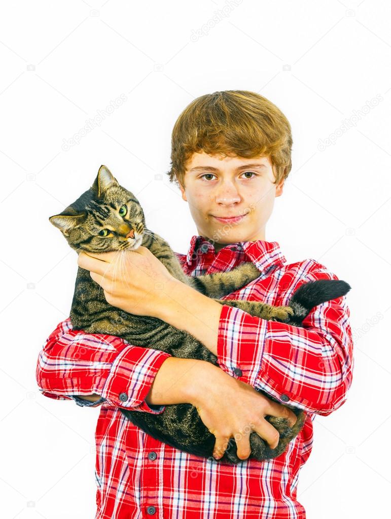 boy with his cat in the arm
