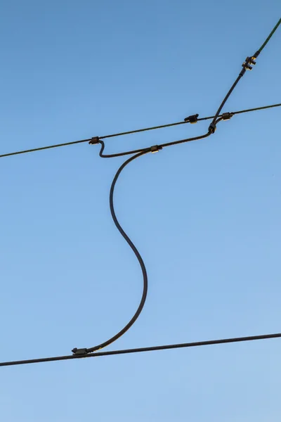 Railroad overhead lines against clear blue sky — Stock Photo, Image