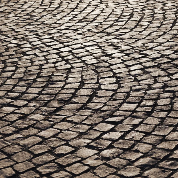 Padrão de rua de pedra velho calhau — Fotografia de Stock