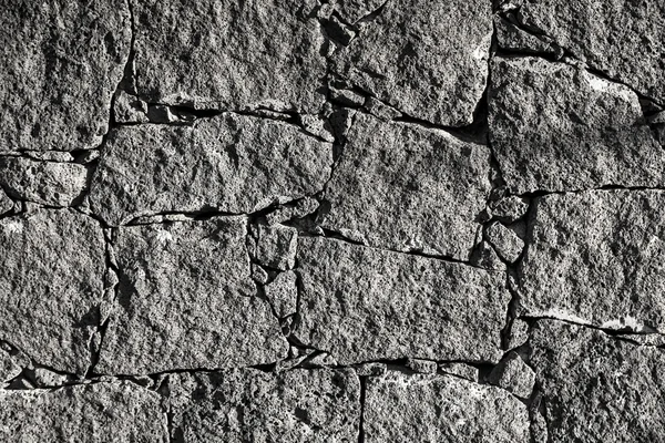 Texture of the black volcanic rock wall from Lanzarote, Canary I — Stock Photo, Image