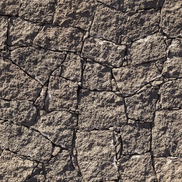 Texture of the black volcanic rock wall from Lanzarote, Canary I — Stock Photo, Image