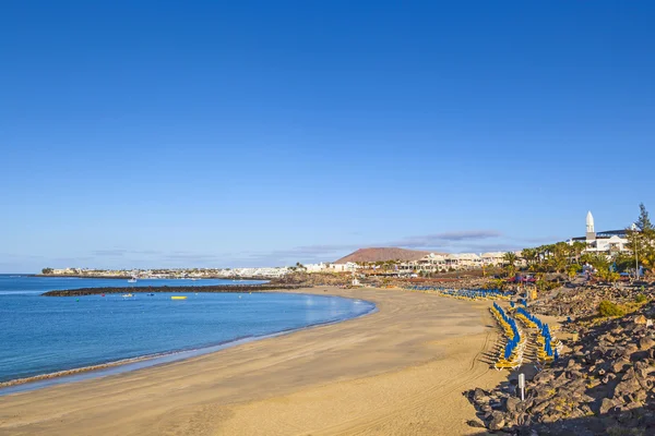 Strand van playa blanca zonder in de vroege ochtend — Stockfoto