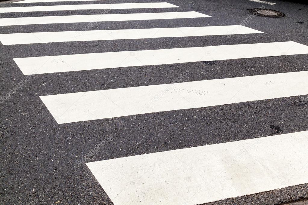 pedestrian crossing marked with white paint