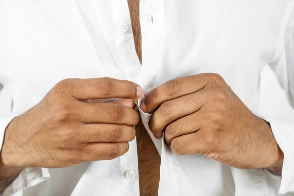 Man buttoning his shirt — Stock Photo, Image