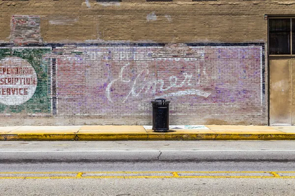 Old painted advertising at the wall — Stock Photo, Image