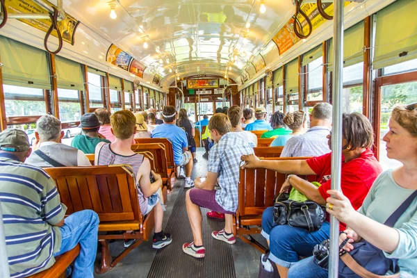 Passengers fill the seats of one of the historic green St. Charl — Stock Photo, Image
