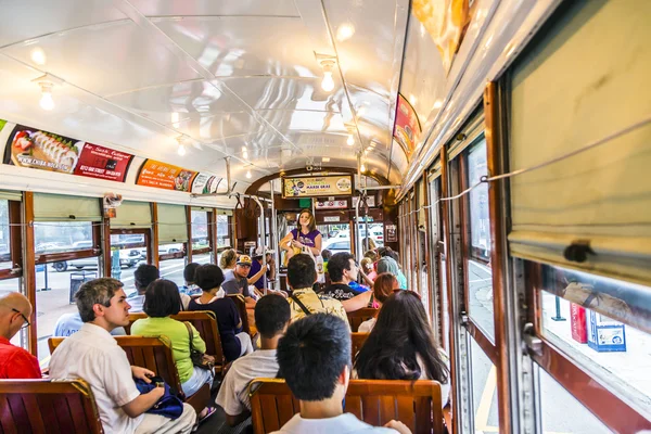 People travel with the famous old Street car St. Charles line — Stok fotoğraf