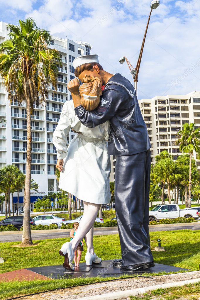 SARASOTA, USA - JULY 25: statue Unconditional surrender by Seward Johnson from 2006 show a sailor and a nurse kissing at times square after proclamation of WW2 End on July 25, 2013 in Sarasota, USA.