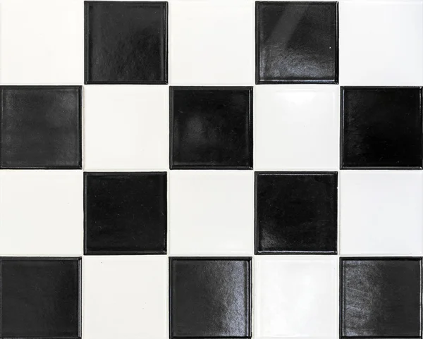 Black and white wall tiles in harmonic pattern — Stockfoto