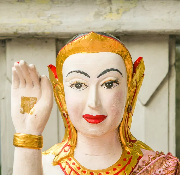 Buddha gives a peace sign — Stock Photo, Image