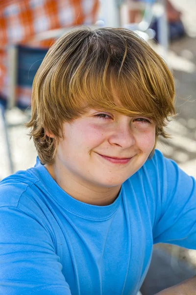 Outdoor portrait of relaxed cute young boy — Stock Photo, Image