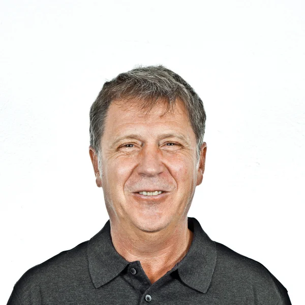 Smart smiling man in studio — Stock Photo, Image