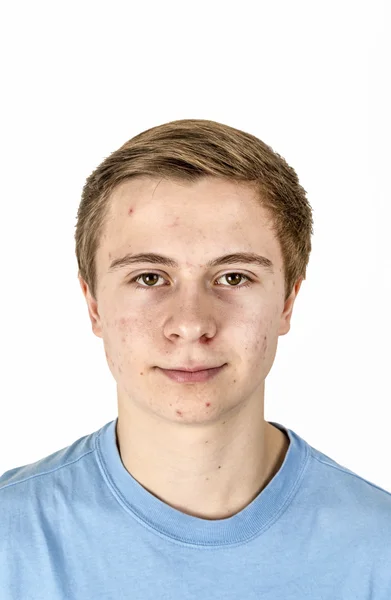 Cool boy with blue shirt posing in studio — Stock Photo, Image