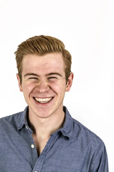 Cool boy with red hair posing in studio — Stock Photo, Image