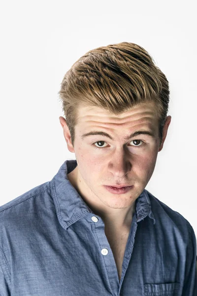 Cool boy with red hair posing in studio — Stock Photo, Image