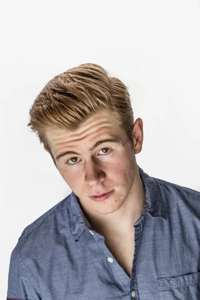 Cool boy with red hair posing in studio — Stock Photo, Image