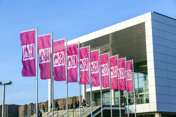 Entrance and flag of the ISM in Cologne — Stock Photo, Image