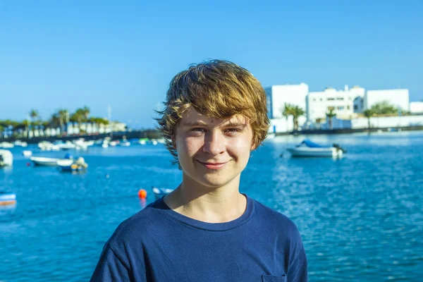 Handsome happy smiling boy at famous charco de San Gines in back — Stock Photo, Image