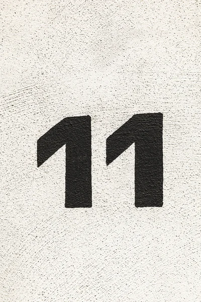 House number 11at the wall — Stock Photo, Image