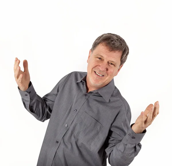 Happy friendly man greets with hands — Stock Photo, Image