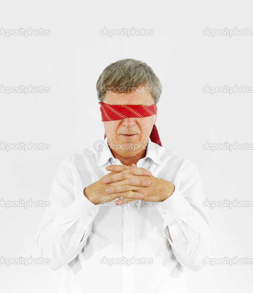 businessman with necktie covering his eyes